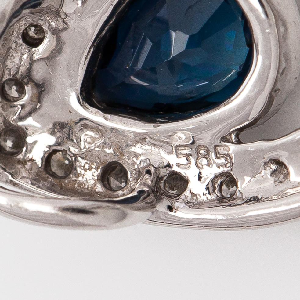 Pendant, faceted sapphire, brilliant cut diamonds, 14K white gold.