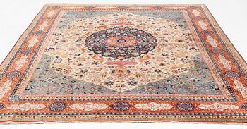 An antique Benlian Tabriz carpet, signed Jabarzade, ca 365 x 270 cm.