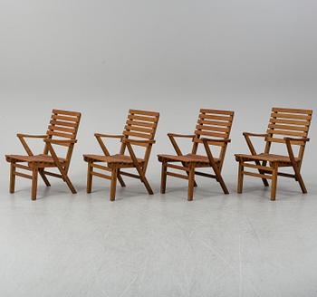 A Carl Malmsten "Bergshamra" garden table and four chairs, first half of the 20th century.