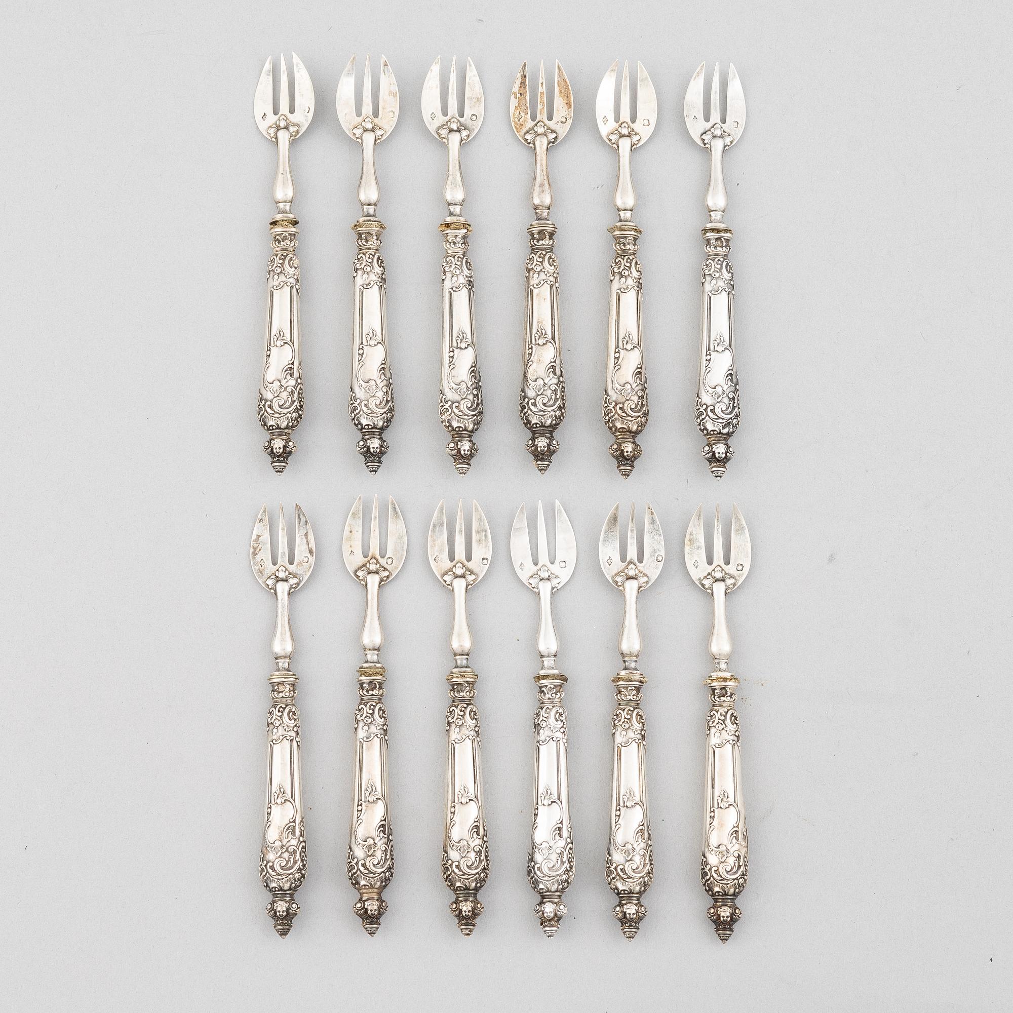 Twelve French Silver Oyster Forks, mark of Louis Coignet, Paris 1889-93.