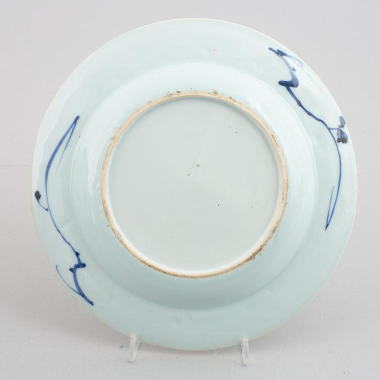 A group of four blue and white dishes and a cabaret piece, Qing dynasty, 18th century.