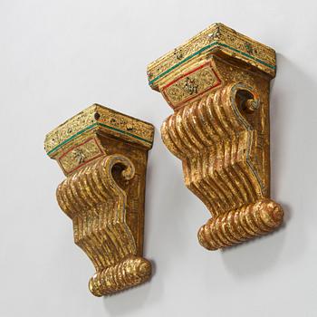 A pair of Southeast Asian temple consoles. Early 20th century.