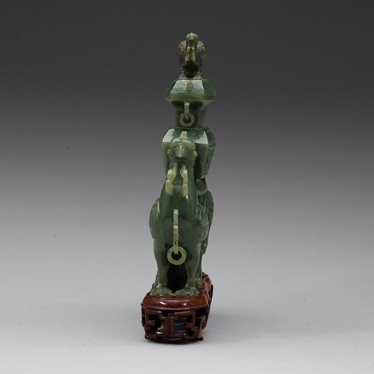 A moss green jade double fenix figurine, 20th century.