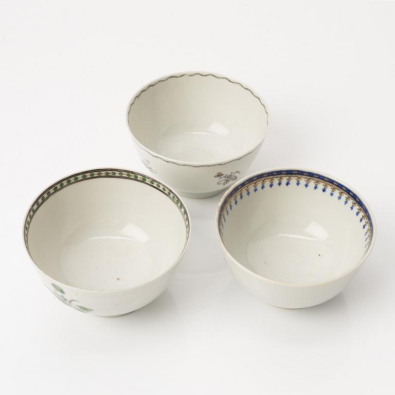 A group of nine Chinese export porcelain cups with stands, Qing dynasty, late 18th century.