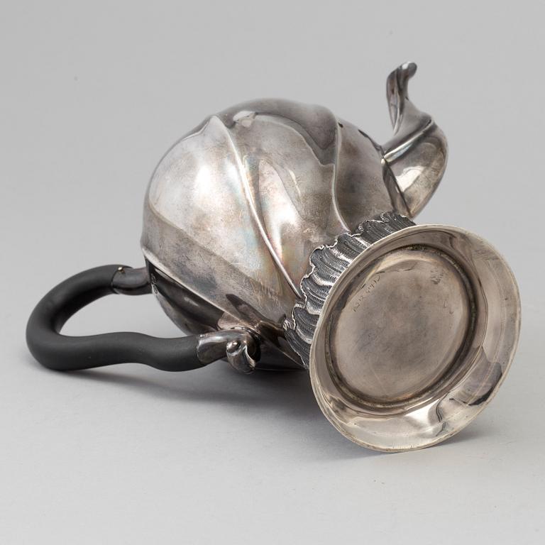 A bulbous silver coffeepot maker's mark Charles Stuart Harris, London, 1893.