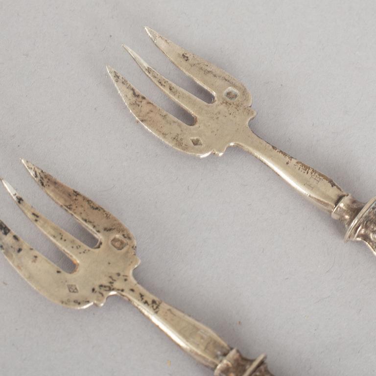 A set of twelve French 19th century silver oyster forks, mark of Hippolyte Thomas, Paris.