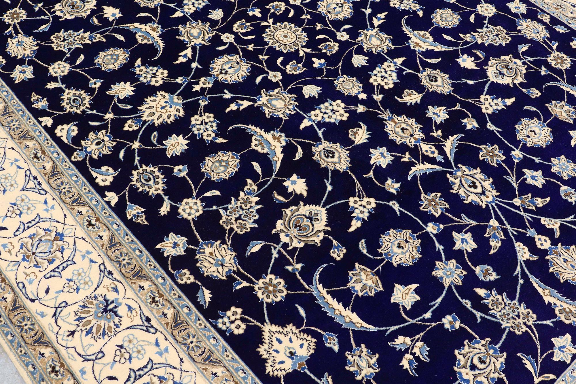 A carpet, Nain part silk, 350 x 250 cm.