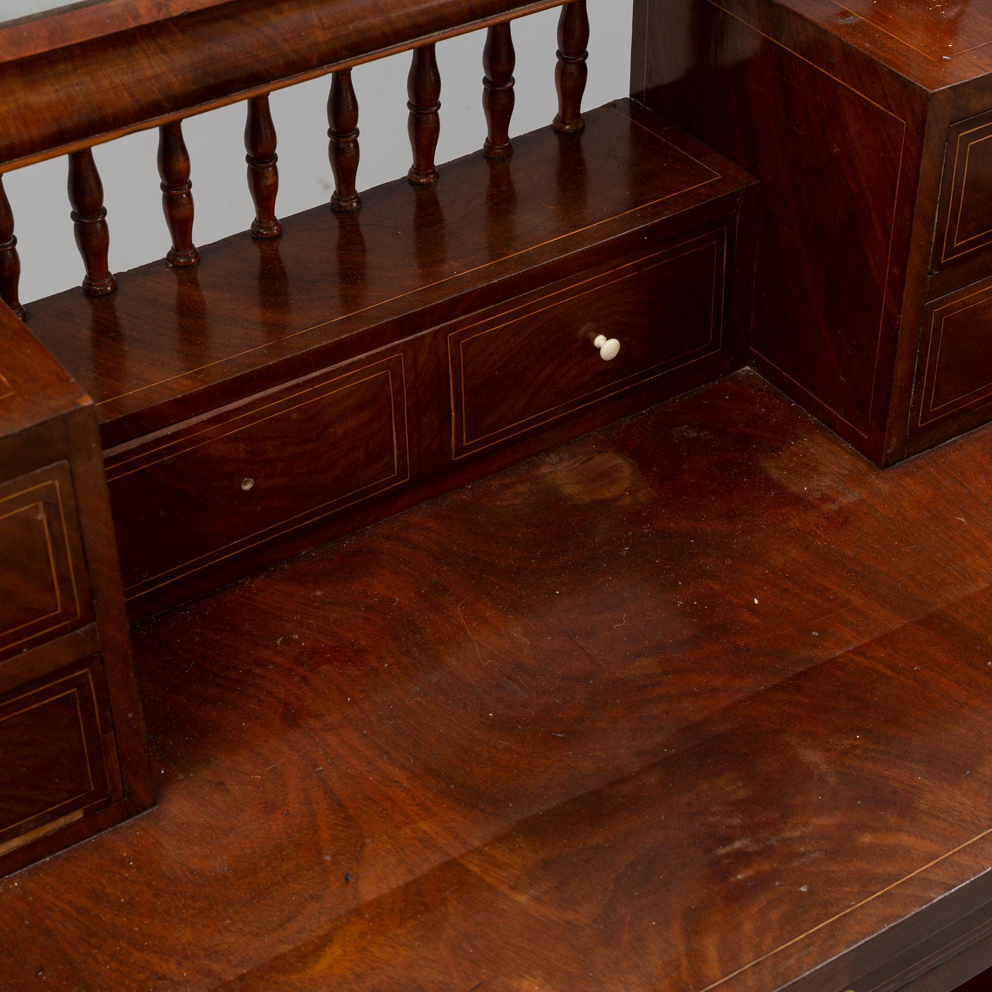 A 19th century Swedish Empire mahogany dressing table.