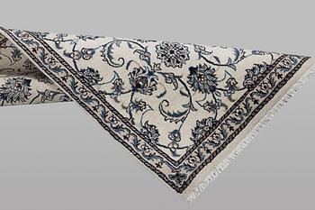A runner carpet, Nain, part silk, ca 248 x 72 cm.