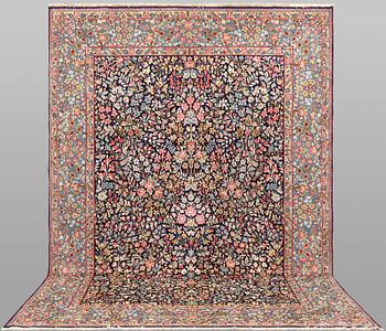 A pictorial 'Millefleur' Kerman carpet, c. 340 x 240 cm.