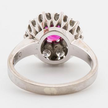 Ring with brilliant-cut diamonds ca 0.56 cts and faceted ruby.