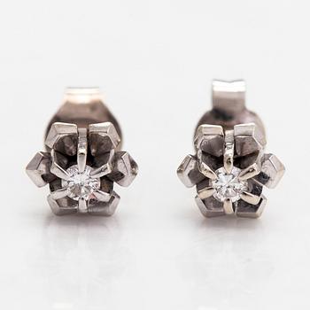 A pair of 14K white gold earrings, with brilliant-cut diamonds totalling approximately 0.06 ct. Finnish hallmarks.