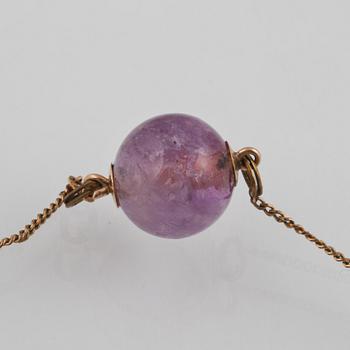 COLLIER SAMT BROSCH, metall med ametister.