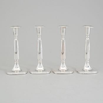 4 silver candle sticks dated 1969-70.