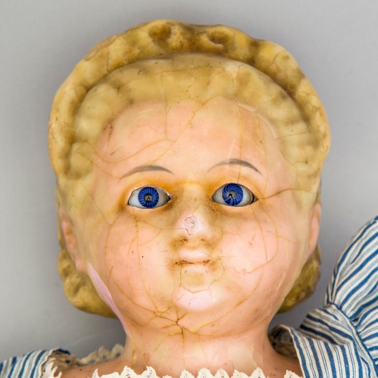 A Wax over papier Mache doll. "Alice in Wonderland". Second half of the 19th century.