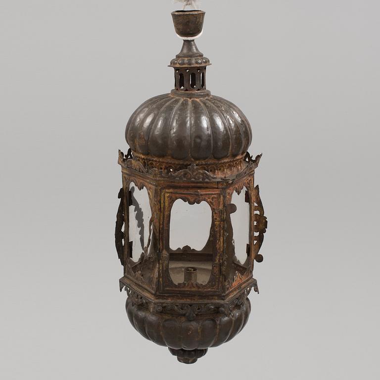 A 17TH CENTURY BAROQUE BRASS LANTERN. Height ca 72 cm.