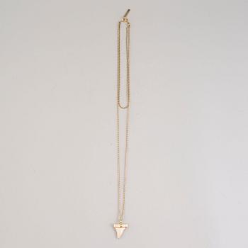 a Givenchy 'Shark tooth' necklace.