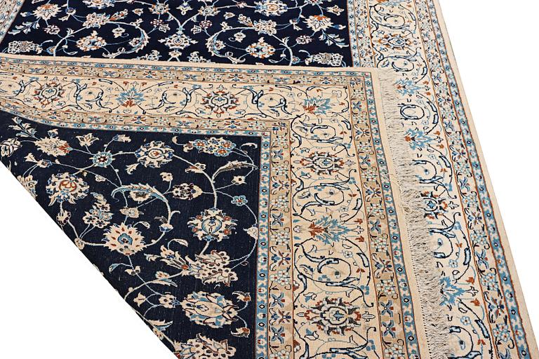 A part silk Nain rug, 9LA, c. 302 x 198 cm.