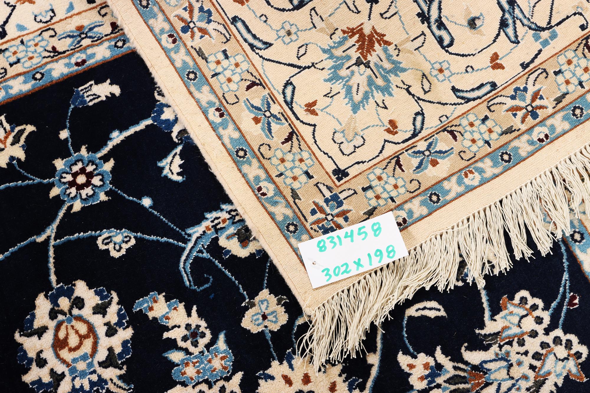 A part silk Nain rug, 9LA, c. 302 x 198 cm.