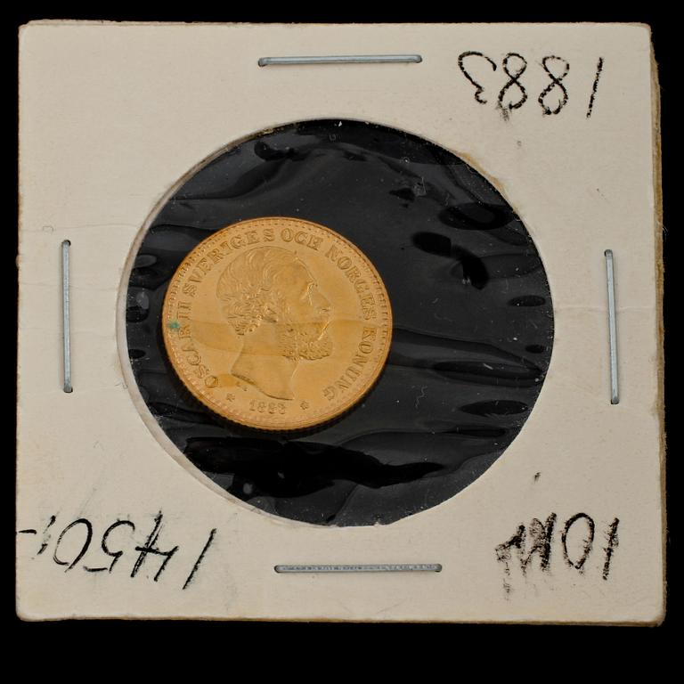 GULDMYNT, Konung Oscar II, 10 kr, daterad 1883. Vikt 6 g inkl fodral.
