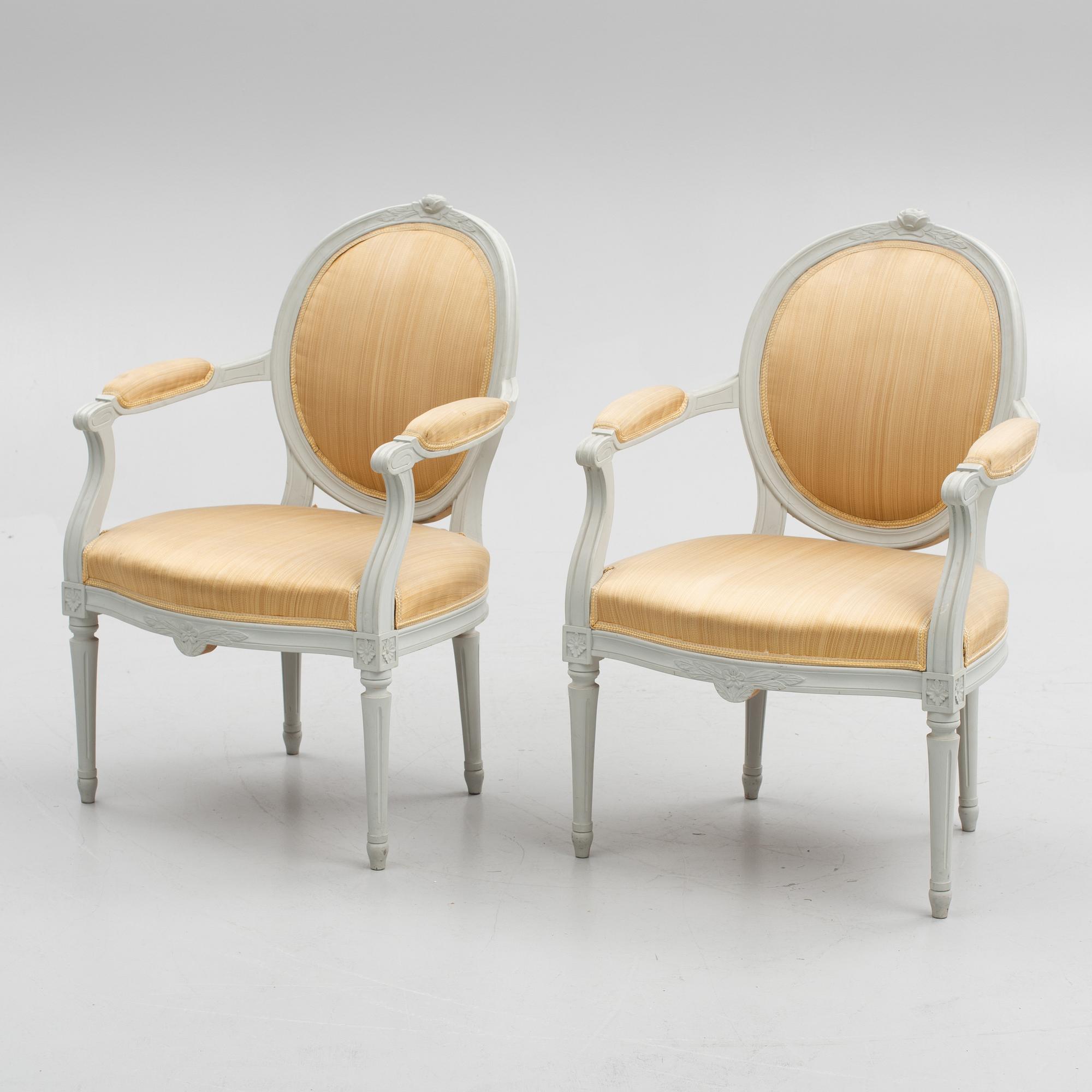 A pair of Gustavian style armchairs, 20th Century.