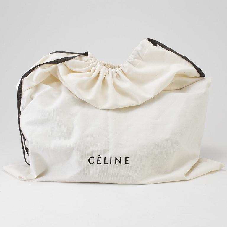 A bag by Celine "Trapeze".