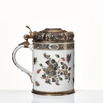 A Silvermounted Meissen tankard, 1740's. Silver makers mark, Nürnberg, Joh. Nic. Wollenberg (1759-1789).