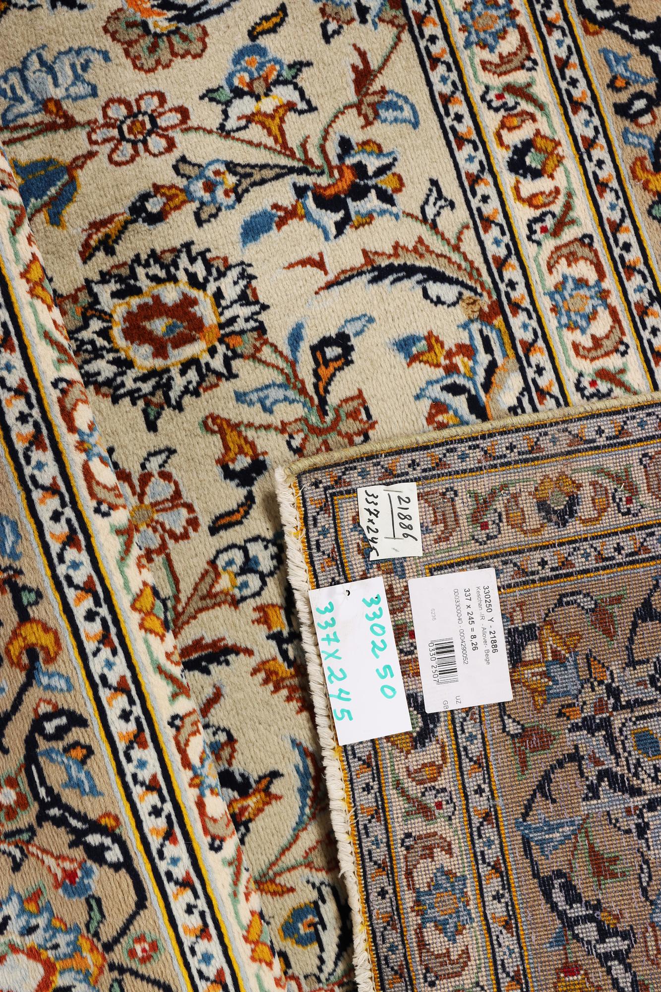 A Kashan carpet, c. 337 x 245 cm.