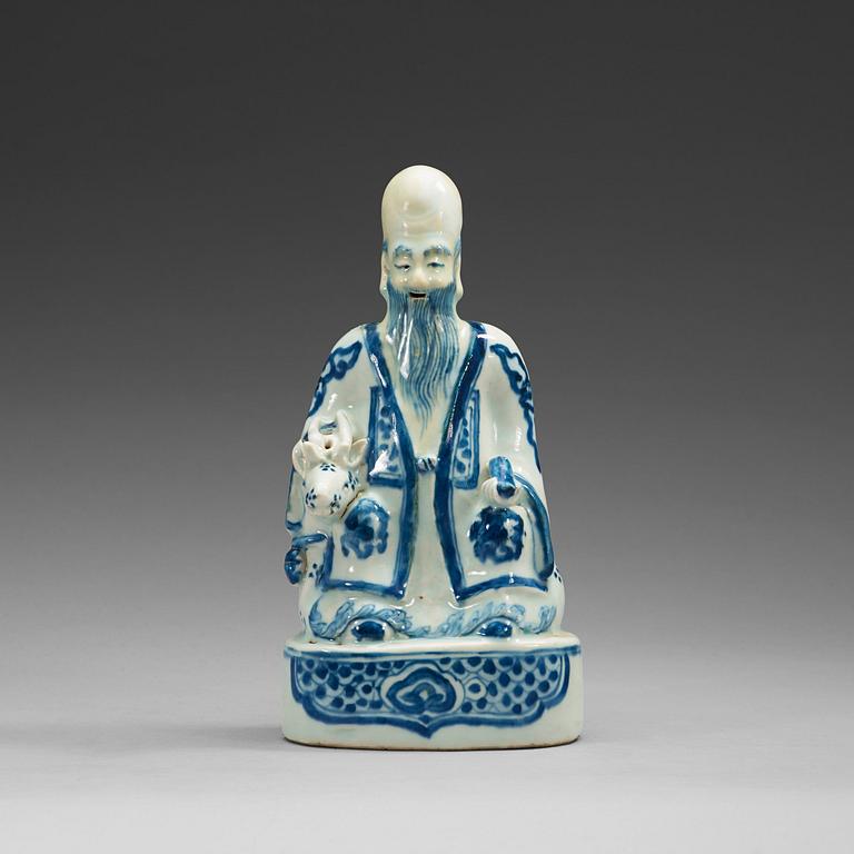 A blue and white figure of Shoulao, Ming dynasty (1368-1644).