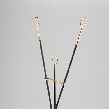 A fireplace stand of three parts by Gunnar Ander for Ystad Metall.