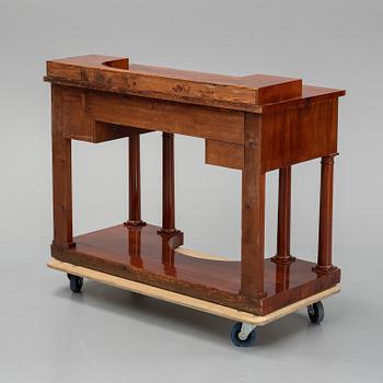 A mahogany console table, Stockholm, first half of the 19th century .