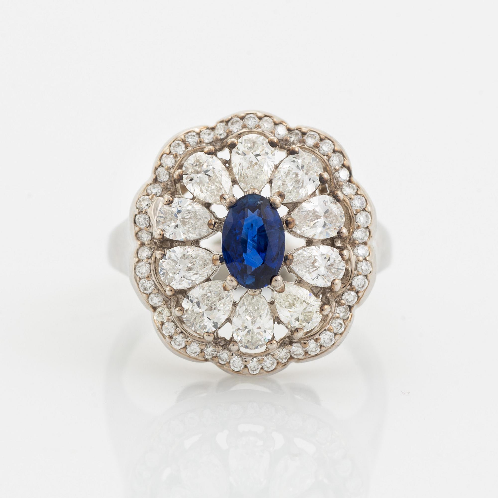 Sapphire and pear and brilliant cut diamond ring.