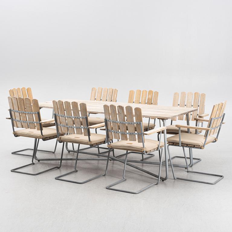 Arthur Lindquist, a model 'A2' garden table and eight chairs, Grythyttans stålmöbler, 21st Century.