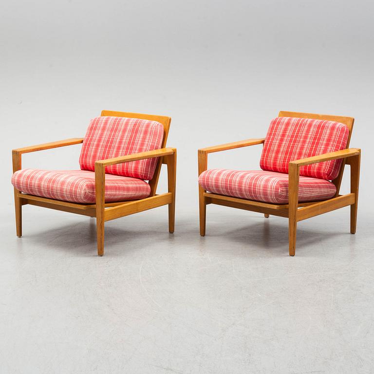 ERIK WØRTS, a pair of oak 'Kastrup' easy chairs from IKEA, designed in 1961.