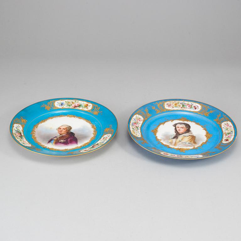 A pair of French porcelain plate, one with Sevrès like mark, early 20th century.