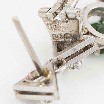 A pair of earrings in 18K white gold with tourmalines and round brilliant-cut diamonds.
