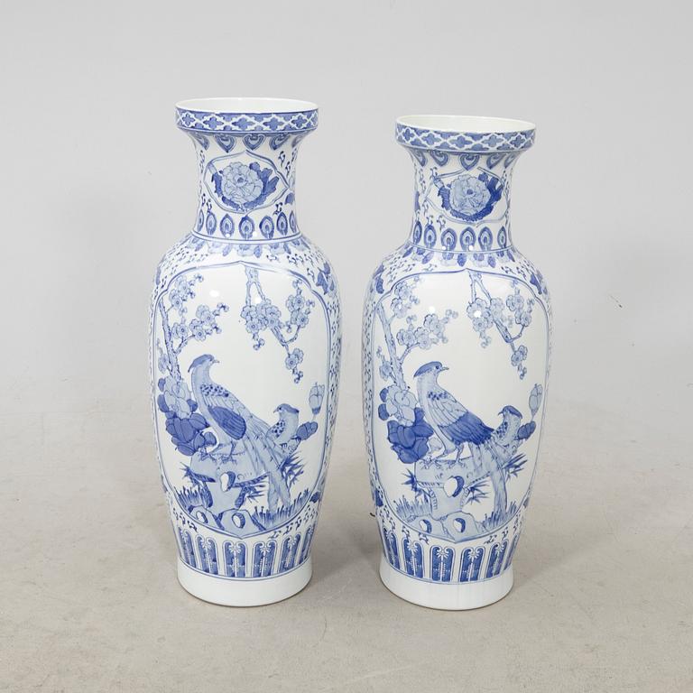 A pair of porcelain 21st century floor vases.