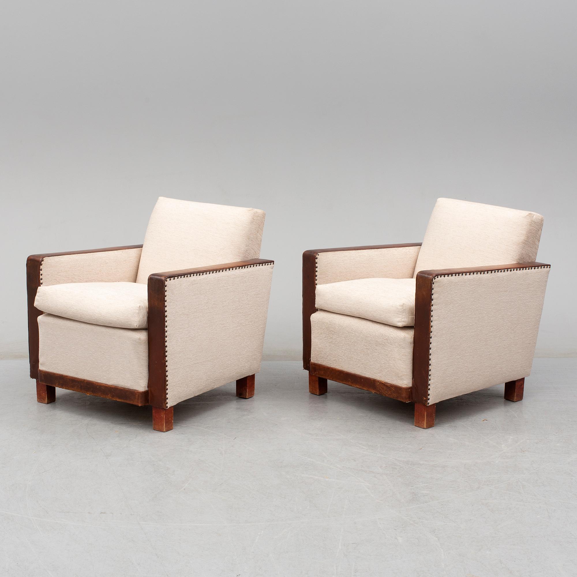 A 1930's pair of model 184 easy chairs by Björn Trägårdh, Firma Svenskt Tenn.