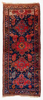 A semi-antique Anatolian rug, c. 335 x 140 cm.