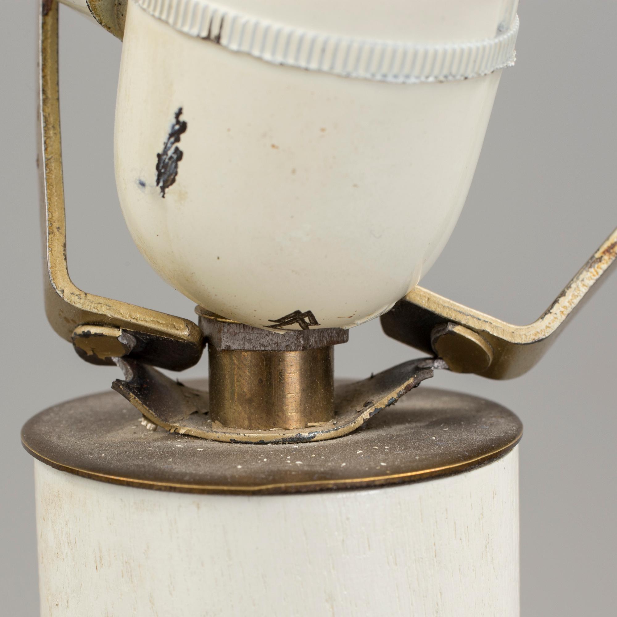 a early 20h Century brass floor lamp.