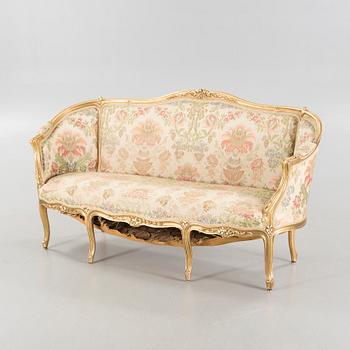 A rococo style sofa from the first half of the 20th century.