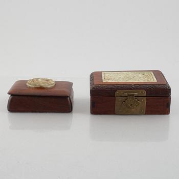 Two Chinese hardwood boxes with nephrite plaques, 20th century.