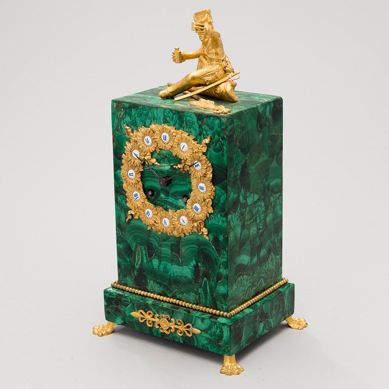 A mid 19th Century French gilt bronze and malachite mantel clock.