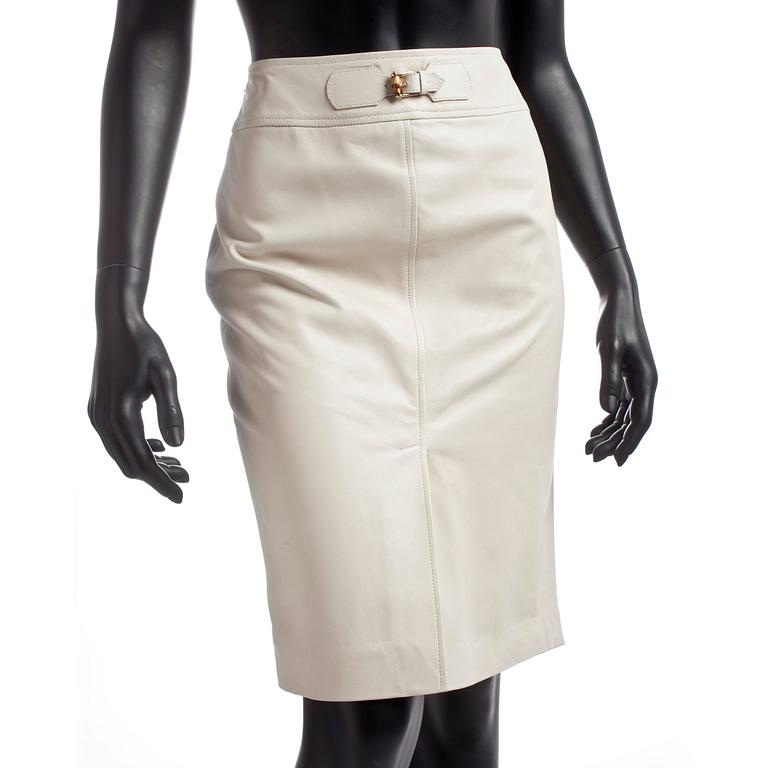 GUCCI, a white leather skirt.