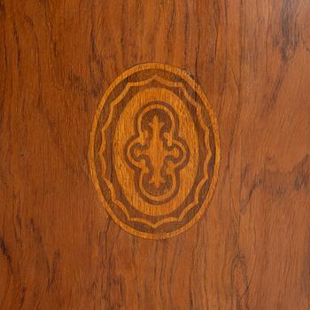 A small cabinet with drawers from around the year 1900.