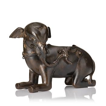 910. A bronze figure/censer of a reclining elephant, Qing dynasty, 19th Century.