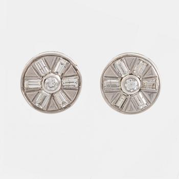 Brilliant and baguette cut diamond earrings.