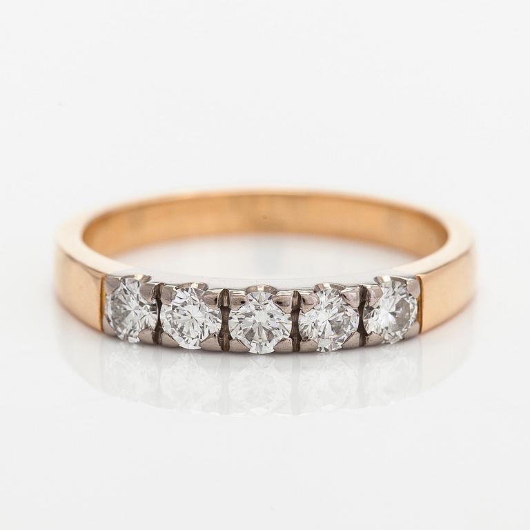 An 18K gold ring, with diamonds totalling approx. 0.30 ct.  Timanttiset, Helsinki.