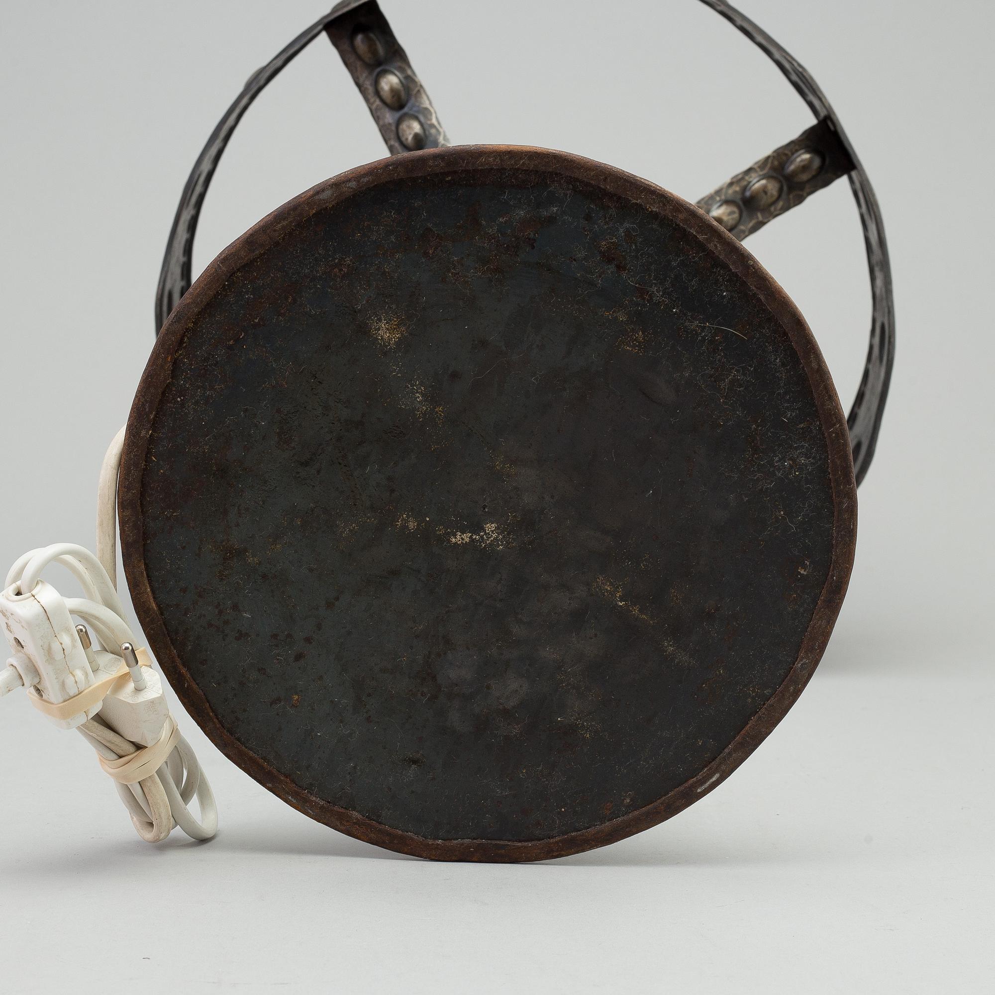 A early 20th century metal table light.