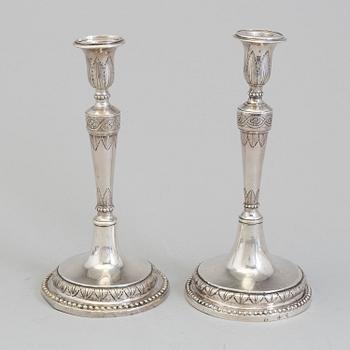 A pair of Italian early 19th century candlesticks, mark of Naples 1804.